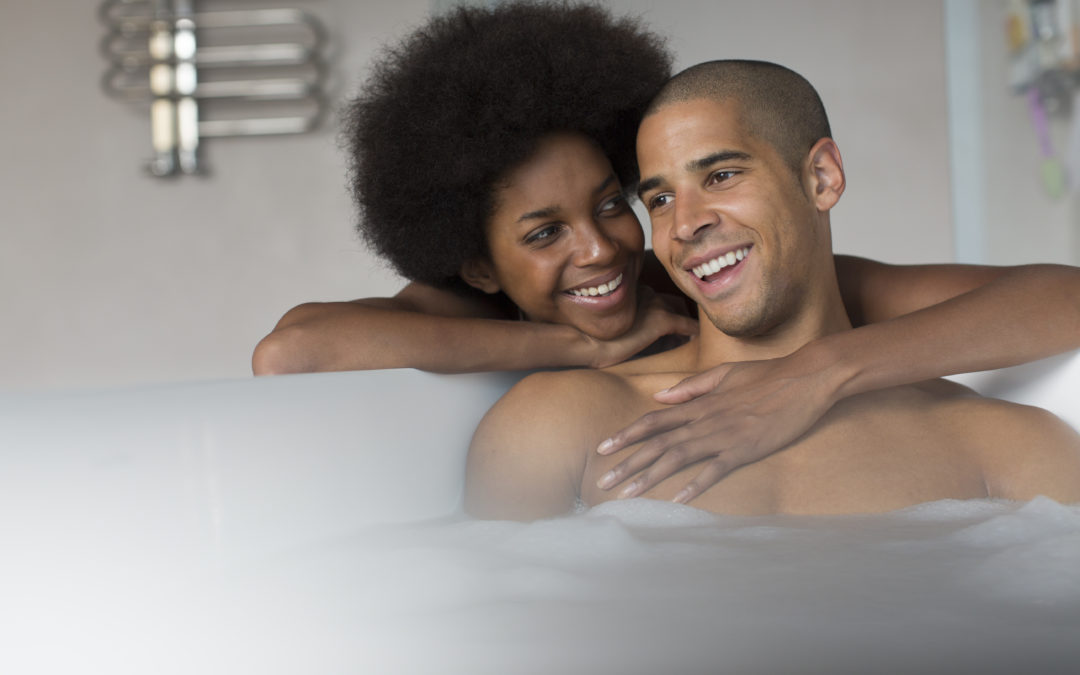 Couple relaxing in a bath